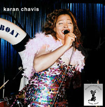 Karan Chavis holding mic singing